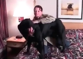 Redhead wife is holding her sexy young puppy